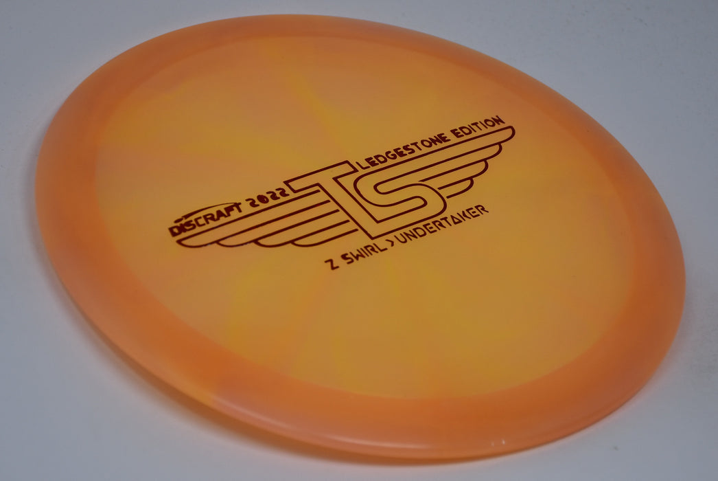 Buy Orange Discraft LE Z Swirl Tour Series Undertaker Ledgestone 2022 Distance Driver Disc Golf Disc (Frisbee Golf Disc) at Skybreed Discs Online Store