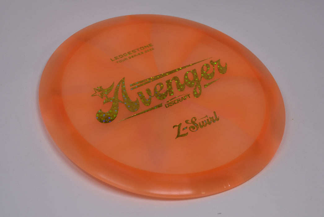 Buy Orange Discraft LE Z Swirl Tour Series Avenger Ledgestone 2022 Distance Driver Disc Golf Disc (Frisbee Golf Disc) at Skybreed Discs Online Store