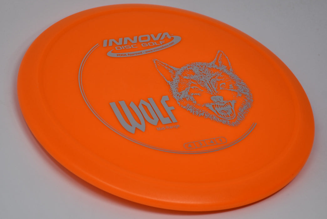 Buy Orange Innova DX Wolf Midrange Disc Golf Disc (Frisbee Golf Disc) at Skybreed Discs Online Store