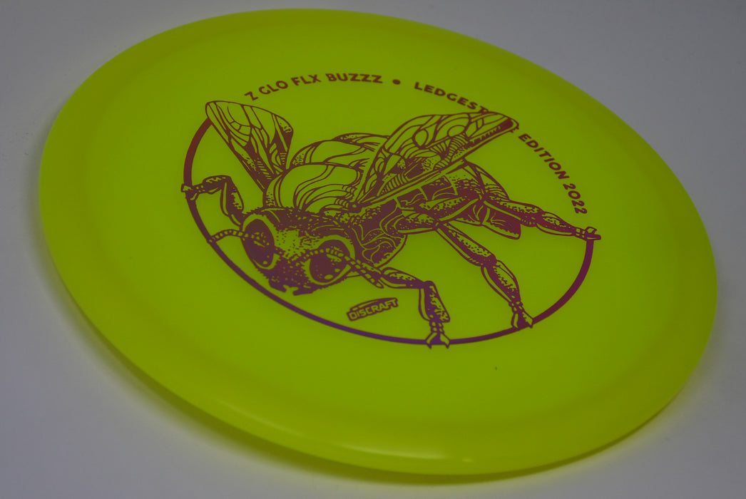 Buy Yellow Discraft LE Z Glo Flx Buzzz Ledgestone 2022 Midrange Disc Golf Disc (Frisbee Golf Disc) at Skybreed Discs Online Store