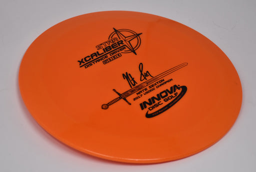 Buy Orange Innova Star Xcaliber Nate Sexton Signature Distance Driver Disc Golf Disc (Frisbee Golf Disc) at Skybreed Discs Online Store